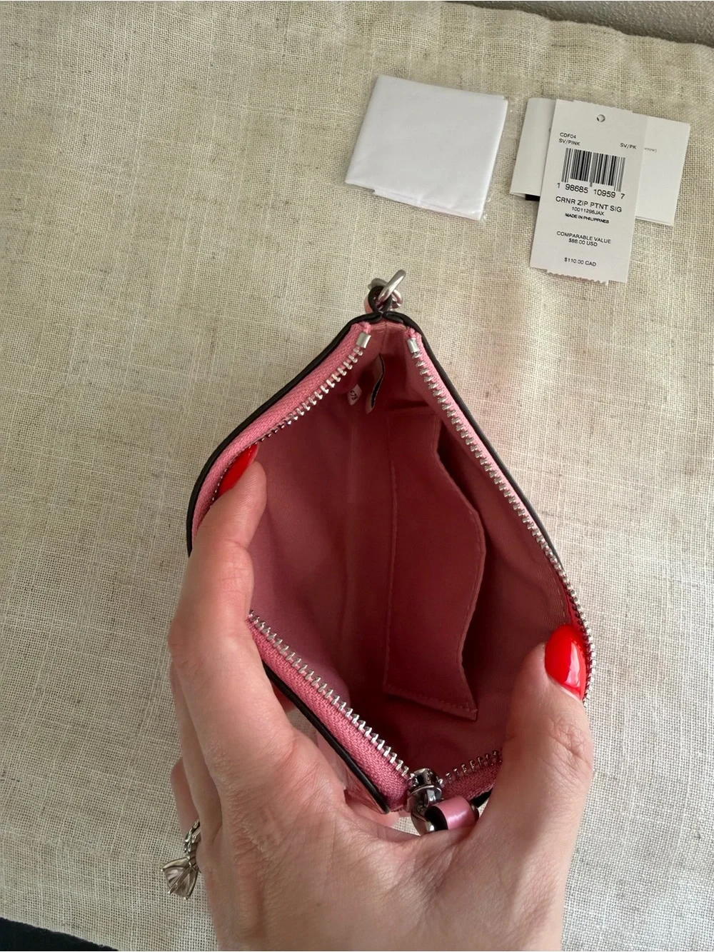 Coach Pink Corner Zip Signature Embossed Leather Wristlet with Heart Charm NWT